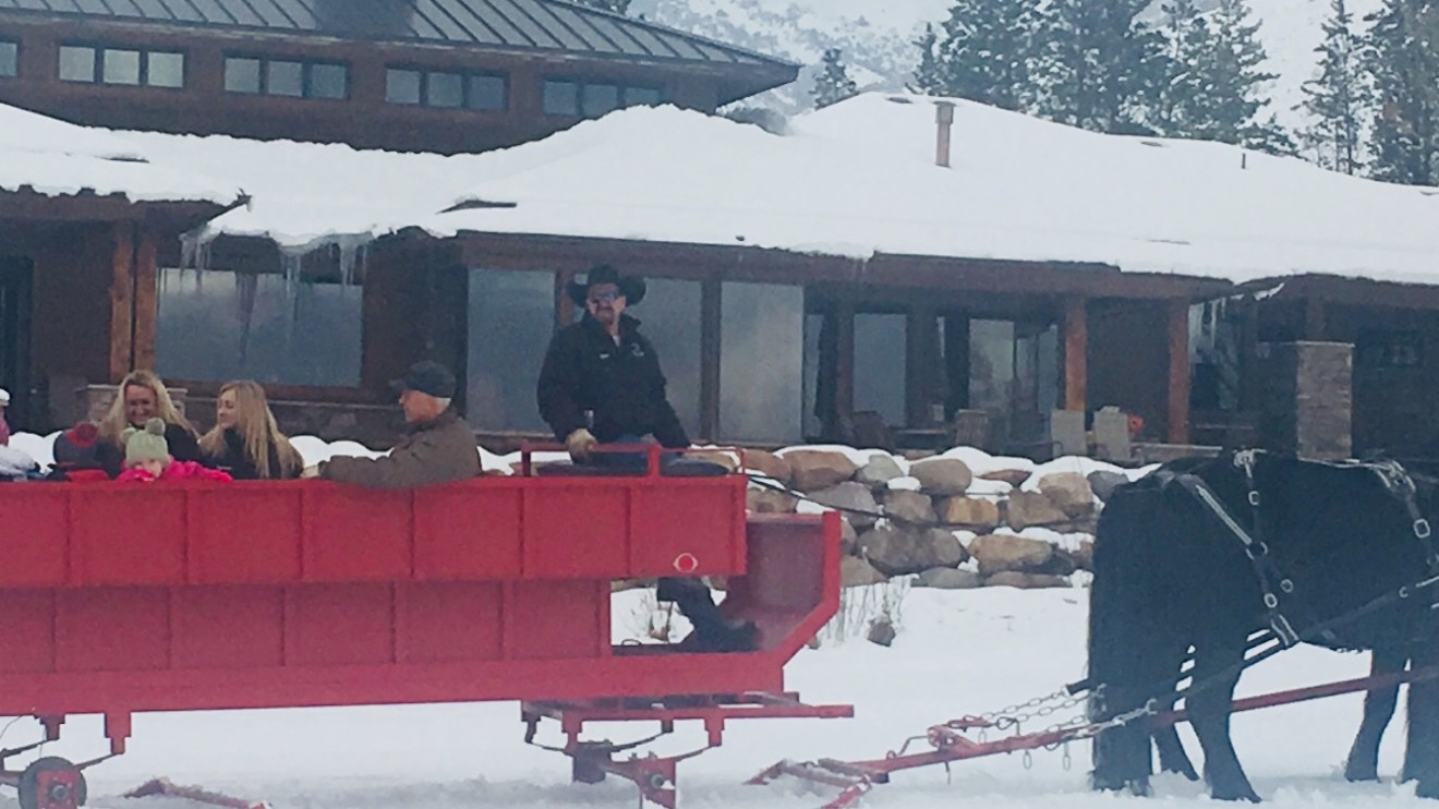 People enjoying a sleigh ride at Wolf Creek